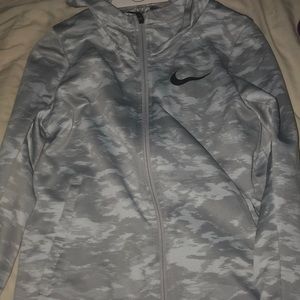 A large zip up camp gray Nike boys hoodie
